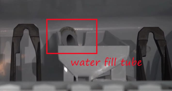 gray water filter tube inside the ice maker