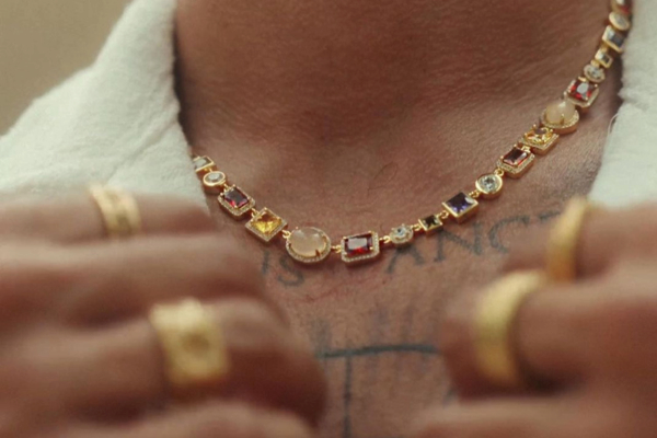 a man wearing craftd london jewelry